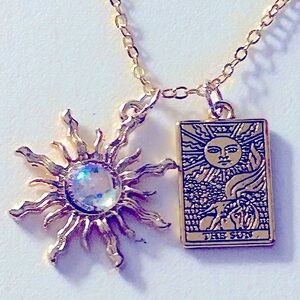 NWOT necklace Sun w “opal” center, The Sun Tarot Card etched goldtone charms 16”
